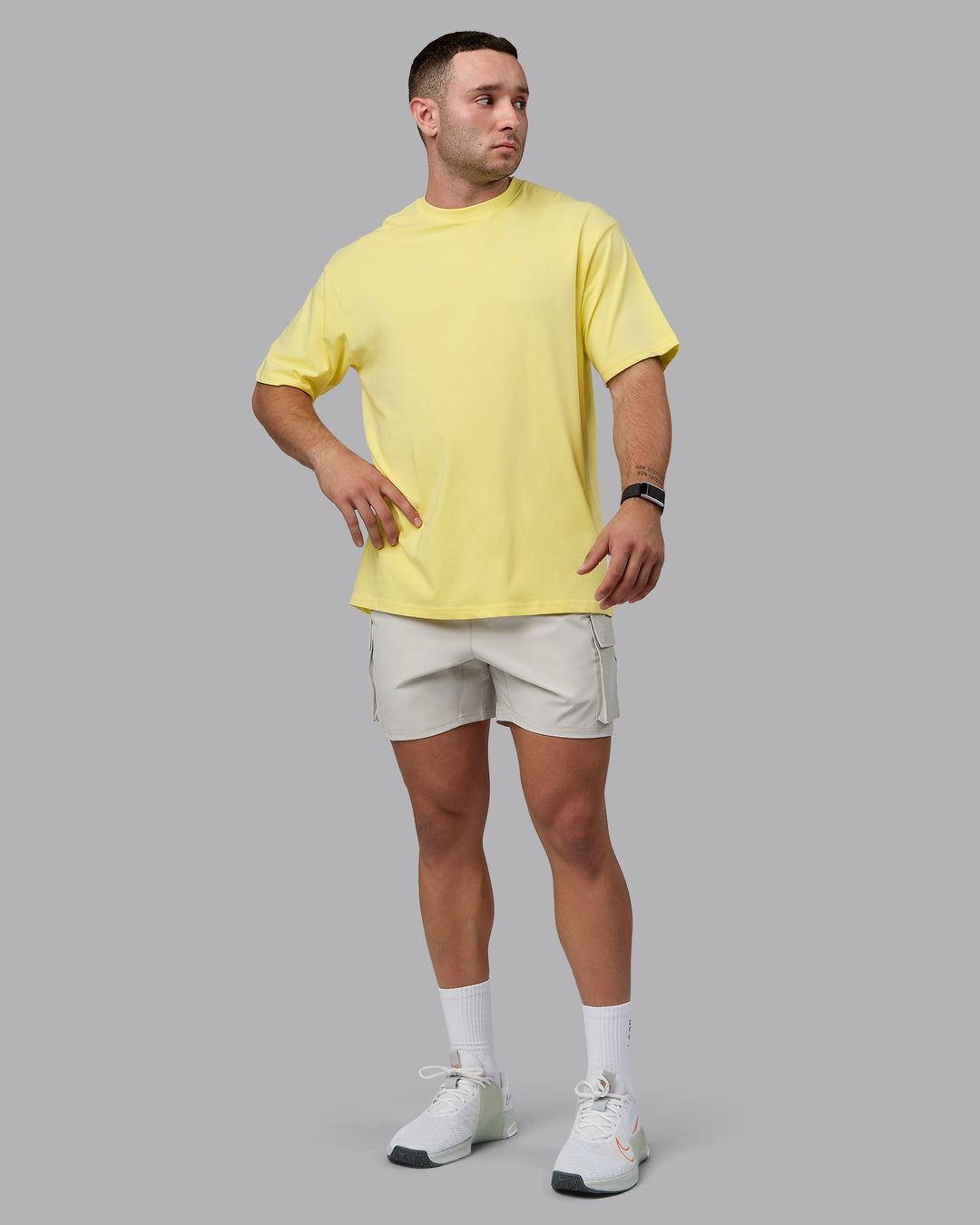 Man wearing Unisex Enjoy the Journey Value Series FLXCotton Tee Oversize - Pale Yellow-Sundress