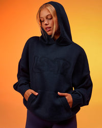Woman wearing All Day Active Knitted Hoodie - Future Navy | Model:Hailey | Size:XS