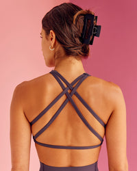 Woman wearing Aspire Sports Bra - Midnight Plum | Model:Bruna | Size:XS