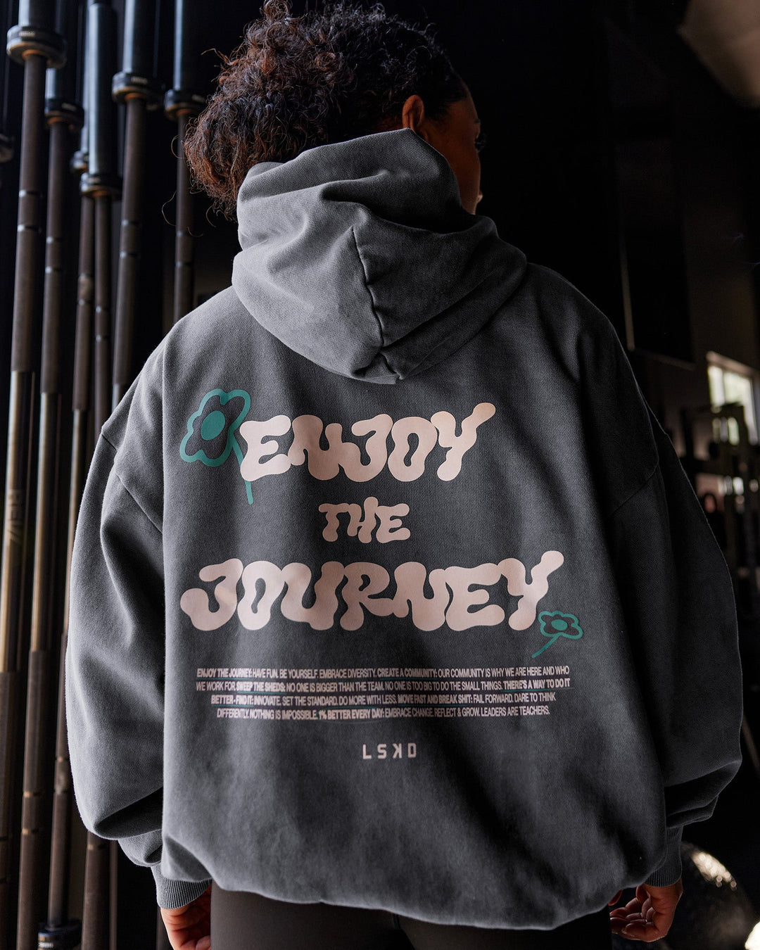 Woman wearing ETJ Values Washed Unisex Oversize Hoodie - Dark Storm-Light Bubblegum | Model:Tarnie | Size:Xs