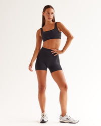 Woman wearing Ember Seamless Sports Bra - Black | Model:Brylee | Size:XS | Thumbnail Index: 3