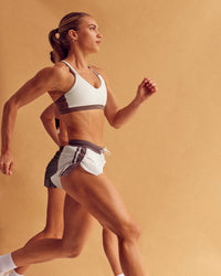 Woman wearing Force Sports Bra - Cocoa Powder-Off White | Model:Maja | Size:XS