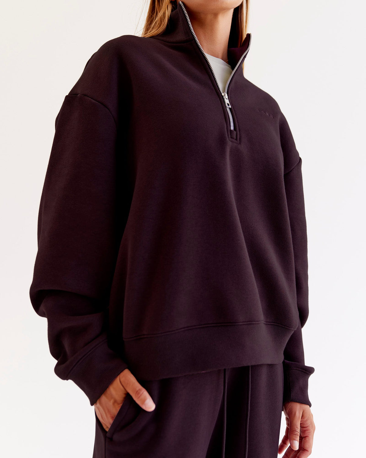 Woman wearing Go-To Oversized Quarter Zip Sweater - Midnight Plum | Model:Jaimee | Size:XS - view 1