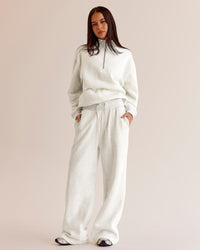 Woman wearing Go-To Oversized Quarter Zip Sweater - Silver Marl | Model:Eliza | Size:XS