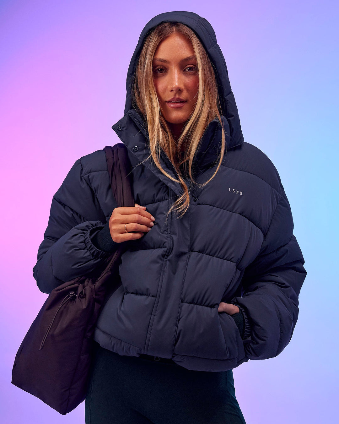 Woman wearing Go-To Puffer Jacket - Future Navy | Model:Georgia | Size:XS - view 1
