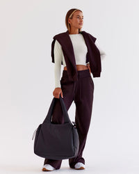 Woman wearing Go-To Wide Leg Track Pant - Midnight Plum | Model:Jaimee | Size:XS | Thumbnail Index: 5