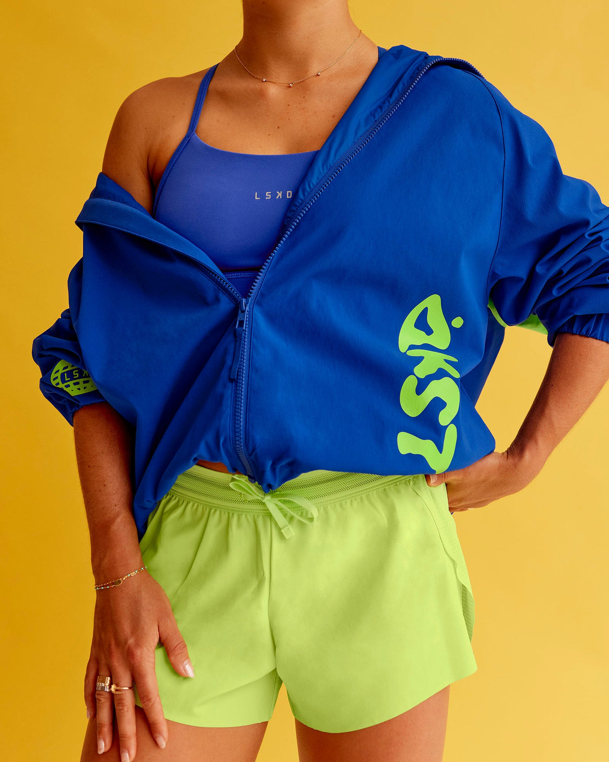 Woman wearing Hype Oversized Track Jacket - Electric Indigo | Model:Bella | Size:XS - view 1