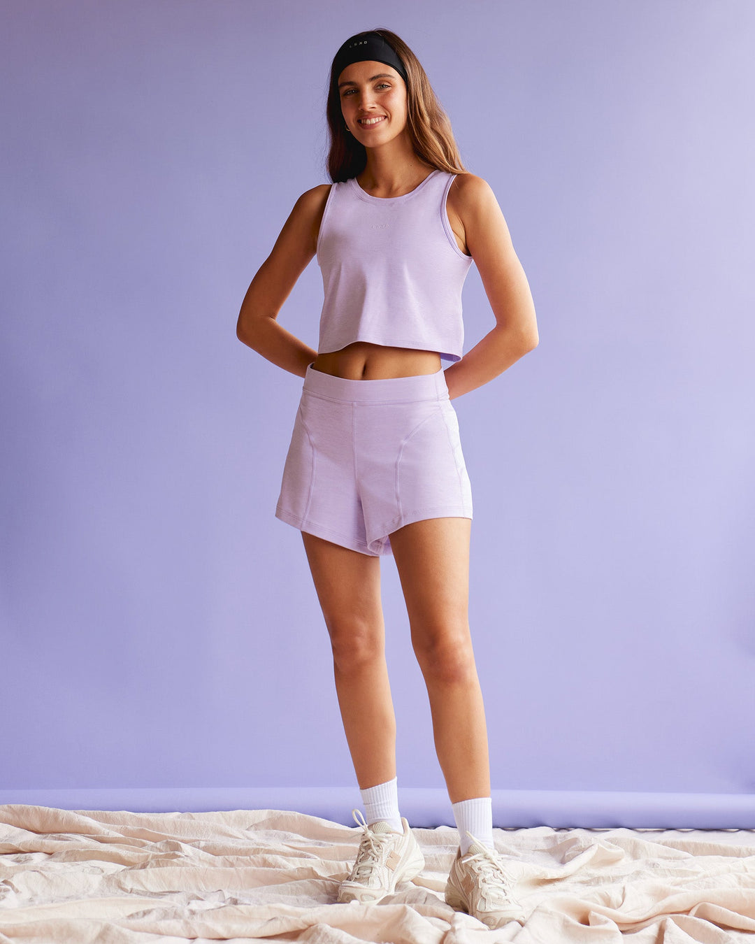 Woman wearing Movement CloudFLX 3&quot; Short - Orchid Bloom Marl | Model:Beatriz | Size:XS