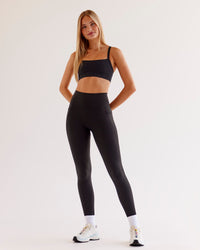 Woman wearing O.G Fusion Ultra High-Rise Full Length Legging Pockets - Black | Model:Taneisha | Size:XS | Thumbnail Index: 5