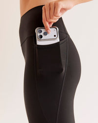 Woman wearing O.G Fusion Ultra High-Rise Full Length Legging Pockets - Black | Model:Taneisha | Size:XS