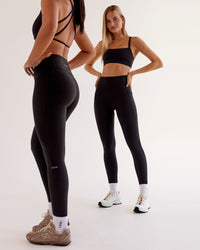 Woman wearing O.G Fusion Ultra High-Rise Full Length Legging Pockets - Black | Model:Taneisha | Size:XS