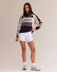 Woman wearing Power Sweater - Black-Shale Beige | Model:Eliza | Size:XS | Thumbnail Index: 1