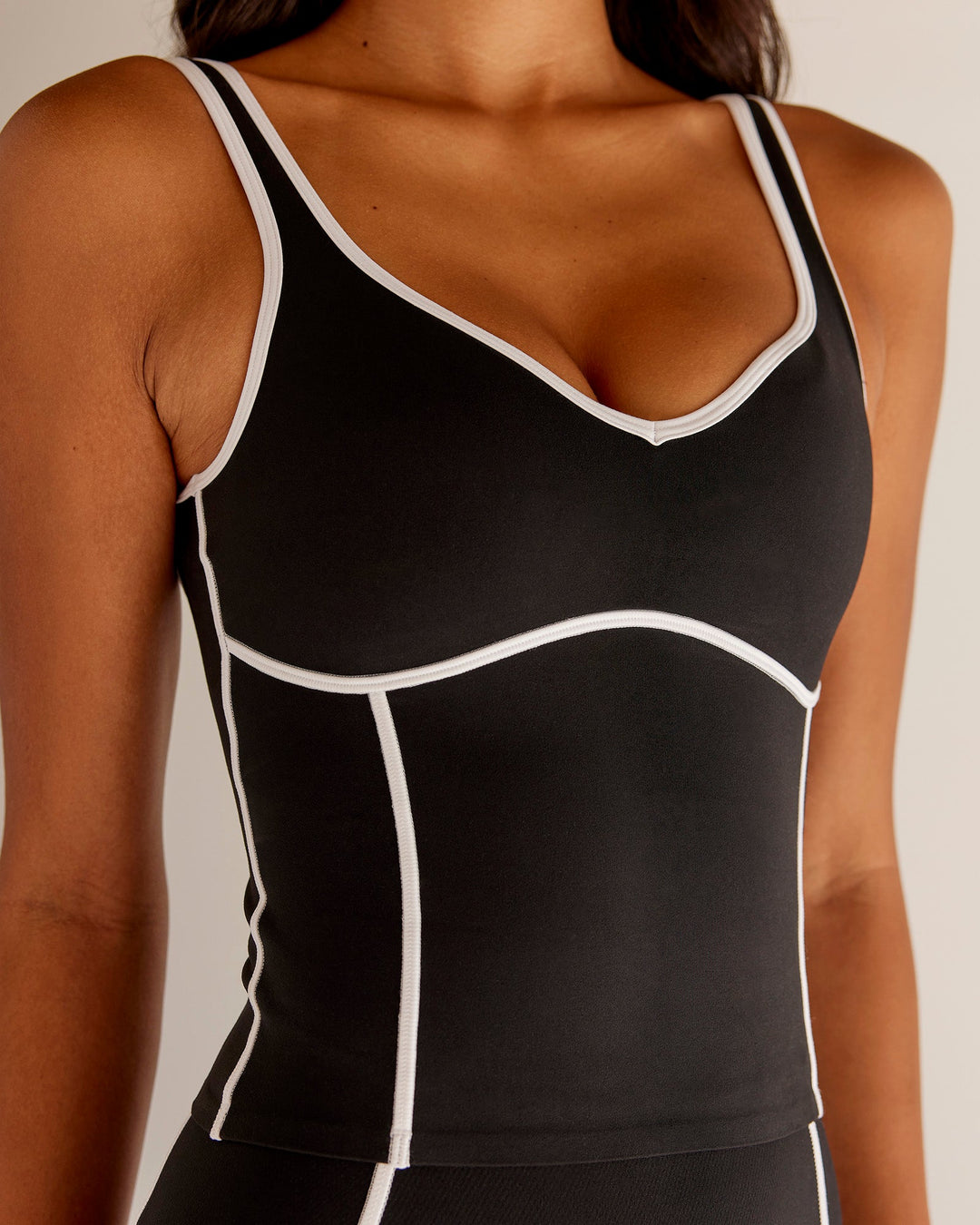 Woman wearing Power Sweetheart Shelf Bra Tank - Black | Model:Tali | Size:XS - view 4