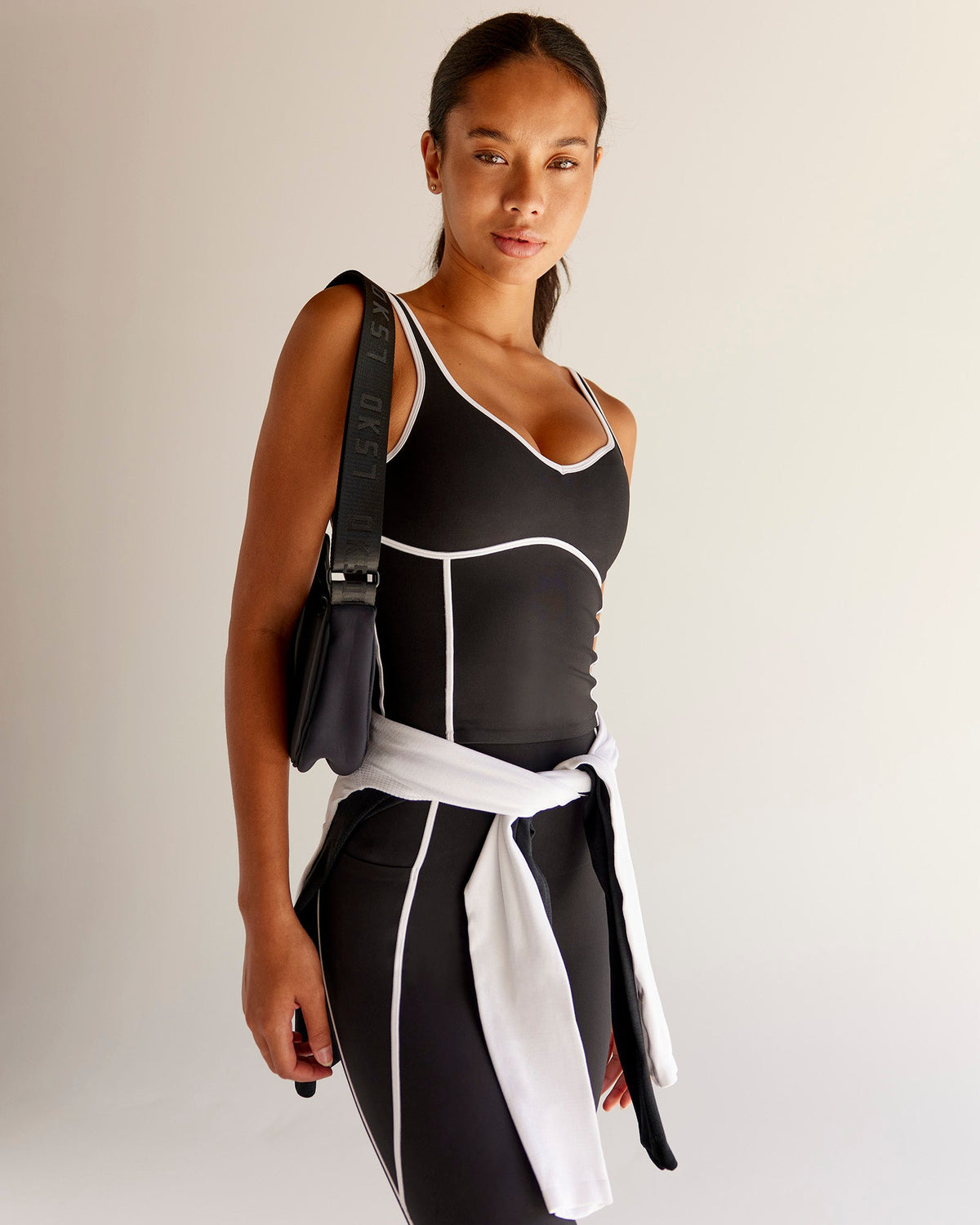 Woman wearing Power Sweetheart Shelf Bra Tank - Black | Model:Tali | Size:XS - view 1