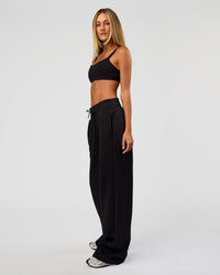 Woman wearing Go-To Wide Leg Track Pant Tall - Black | Model:Georgia | Size:XS | Thumbnail Index: 6