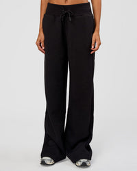 Woman wearing Go-To Wide Leg Track Pant Tall - Black | Model:Georgia | Size:XS | Thumbnail Index: 0