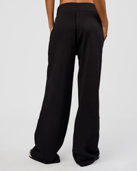 Woman wearing Go-To Wide Leg Track Pant Tall - Black | Model:Georgia | Size:XS | Thumbnail Index: 4