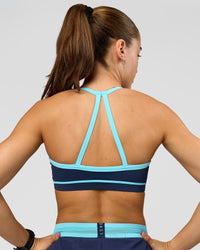 Woman wearing Breeze Sports Bra - Future Navy-Baltic Sea | Model:Grace | Size:XS