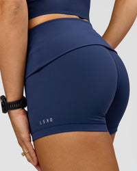 Woman wearing Groovy High Rise Fold Over 4" Short - Future Navy | Model:Grace | Size:XS