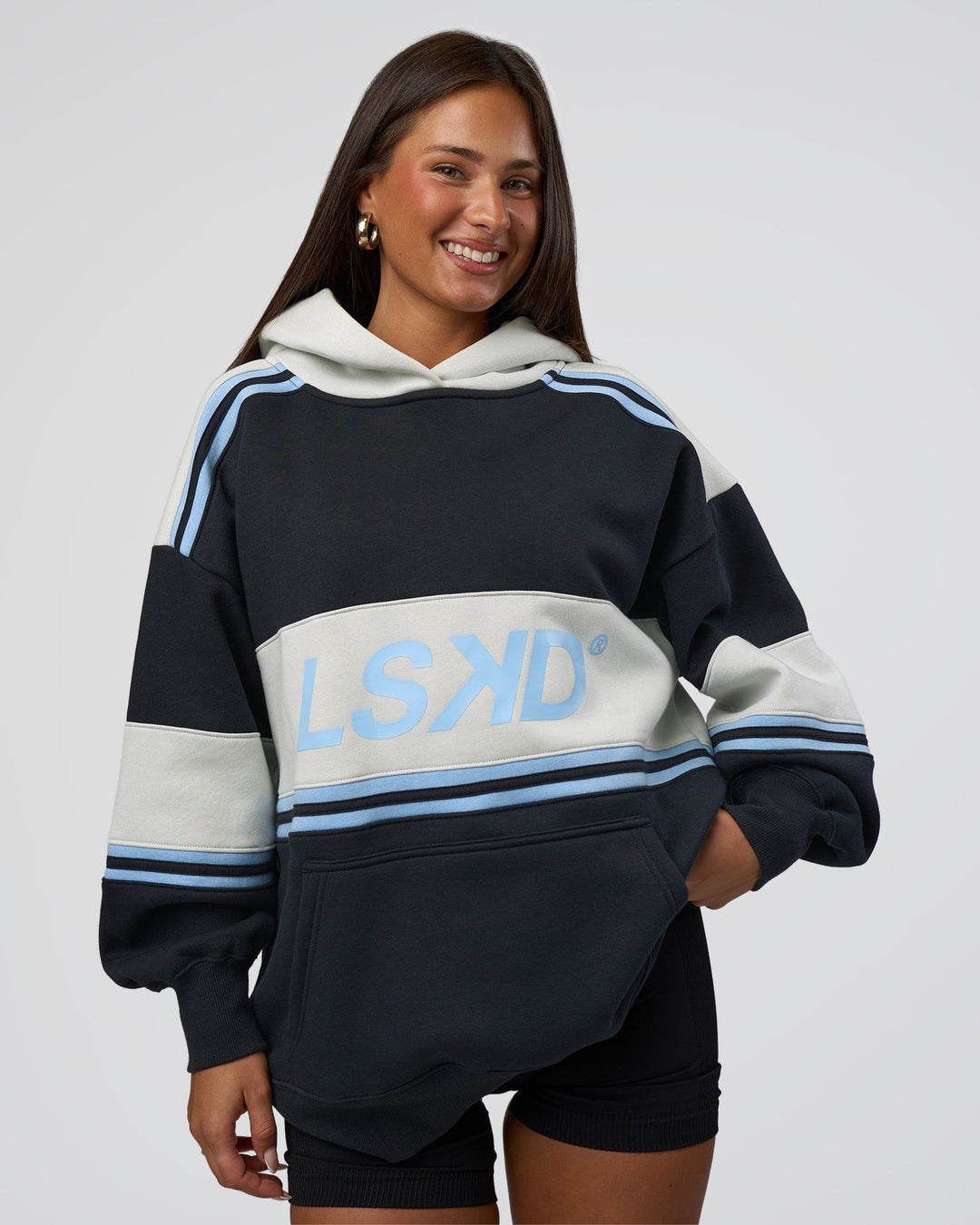 Woman wearing A-Team Oversized Hoodie - Caviar-Open Air | Model:Bianca | Size:XS