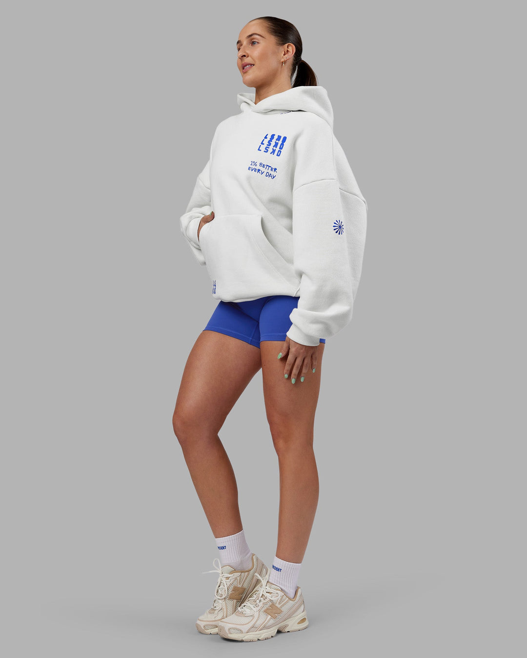 Woman wearing Abs If Not Now When Unisex Oversized Hoodie - Vaporous Gray | Model:Abbey | Size:XS
