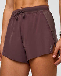Woman wearing Accelerate 3" High-Rise Running Short - Cocoa Powder | Set:true | Angle:closeup | Model:Maja | Size:XS