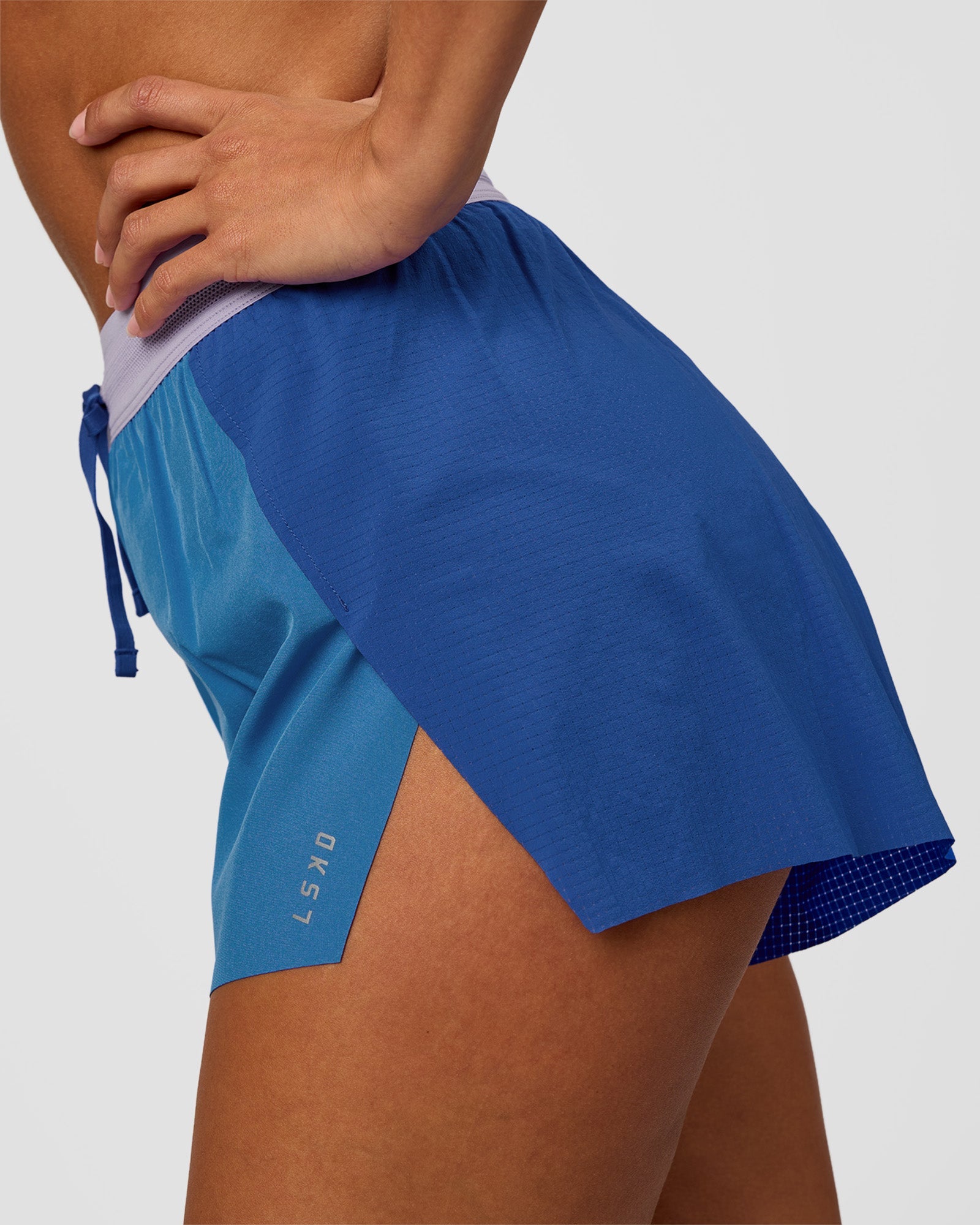 Woman wearing Accelerate 3" High-Rise Running Short - Electric Indigo-Multi | Model:Brylee | Size:XS