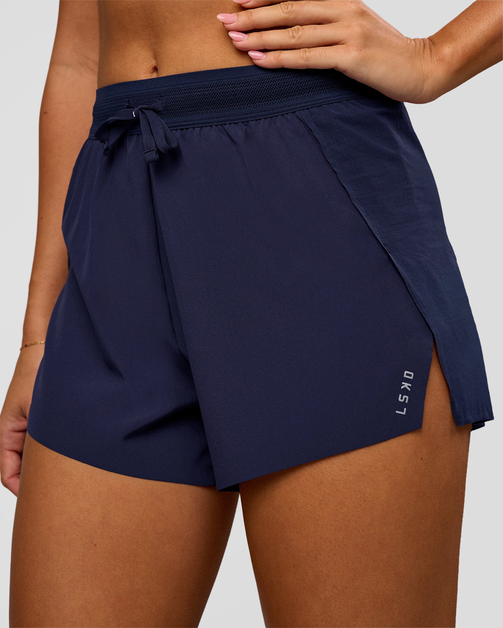 Woman wearing Accelerate 3" High-Rise Running Short in Future Navy | Model:Charli | Size:XS