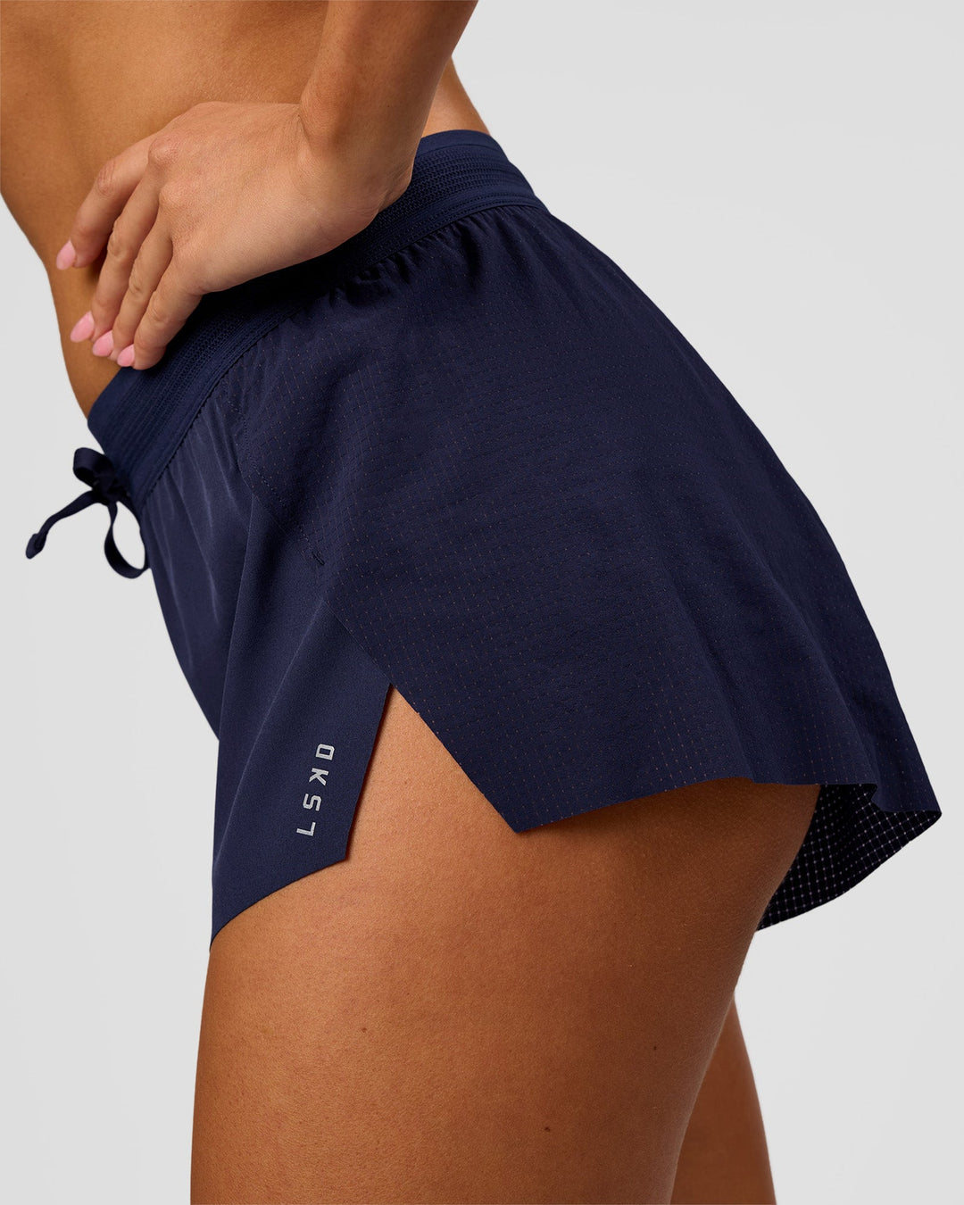 Woman wearing Accelerate 3" High-Rise Running Short in Future Navy | Model:Charli | Size:XS