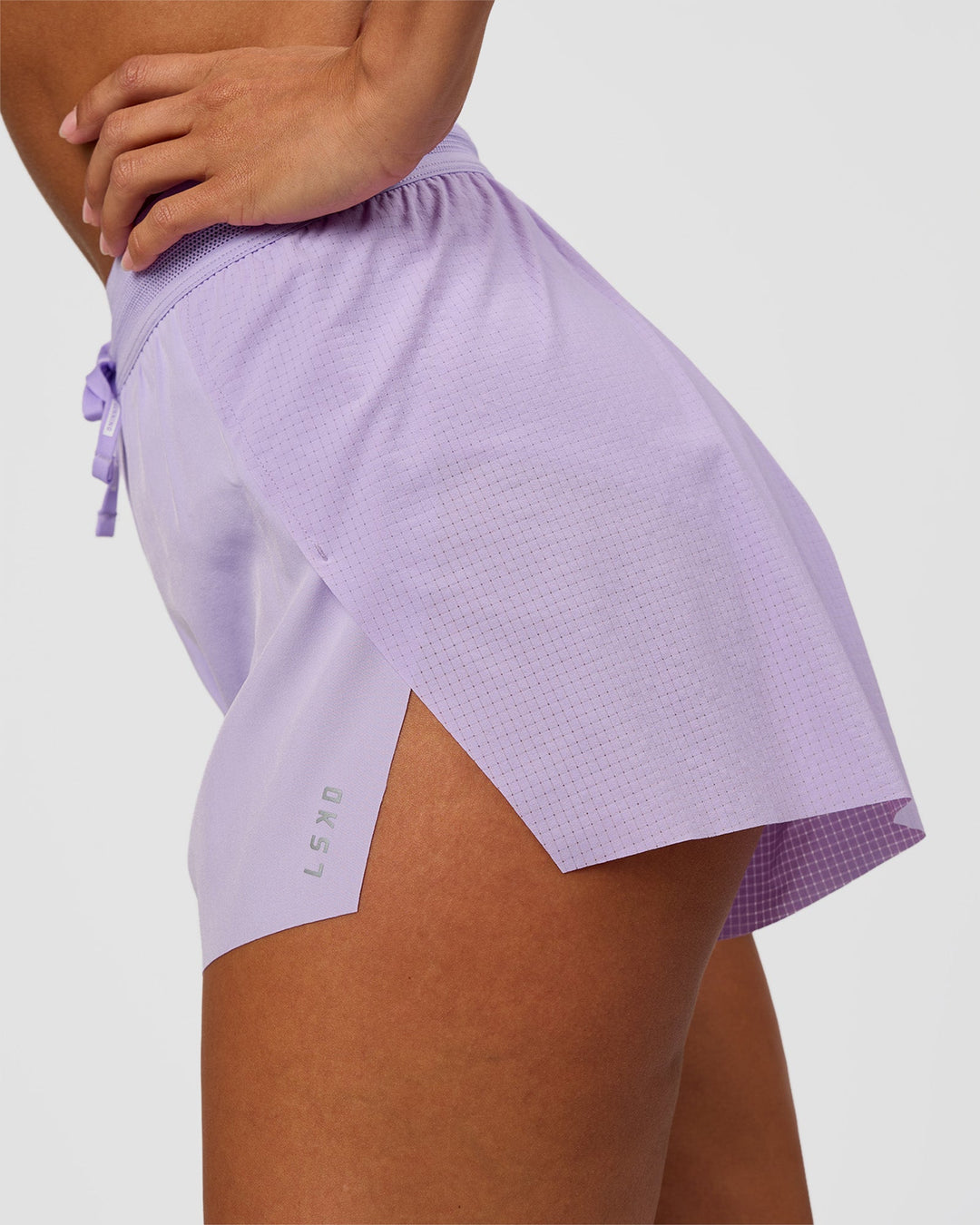 Woman wearing Accelerate 3" High-Rise Running Short - Pale Lilac | Model:Brylee | Size:XS