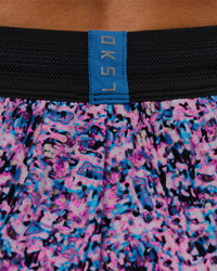 Woman wearing Accelerate 3" Mid-Rise Running Short in Energy Print Blue Multi | Model:Brylee | Size:XS | Thumbnail Index: 10
