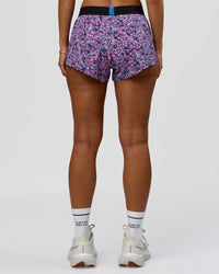 Woman wearing Accelerate 3" Mid-Rise Running Short in Energy Print Blue Multi | Model:Brylee | Size:XS | Thumbnail Index: 2