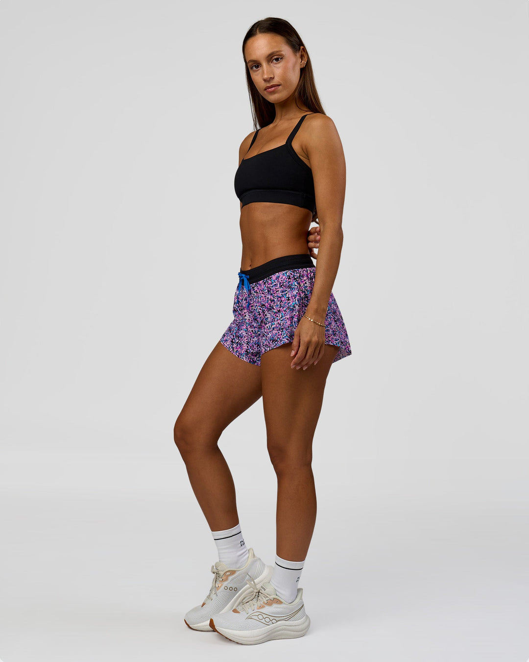 Woman wearing Accelerate 3" Mid-Rise Running Short in Energy Print Blue Multi | Model:Brylee | Size:XS - view 7