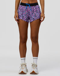 Woman wearing Accelerate 3" Mid-Rise Running Short in Energy Print Blue Multi | Model:Brylee | Size:XS | Thumbnail Index: 7