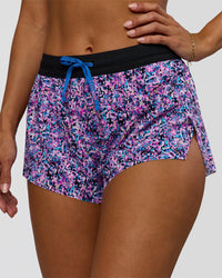 Woman wearing Accelerate 3" Mid-Rise Running Short in Energy Print Blue Multi | Model:Brylee | Size:XS | Thumbnail Index: 0