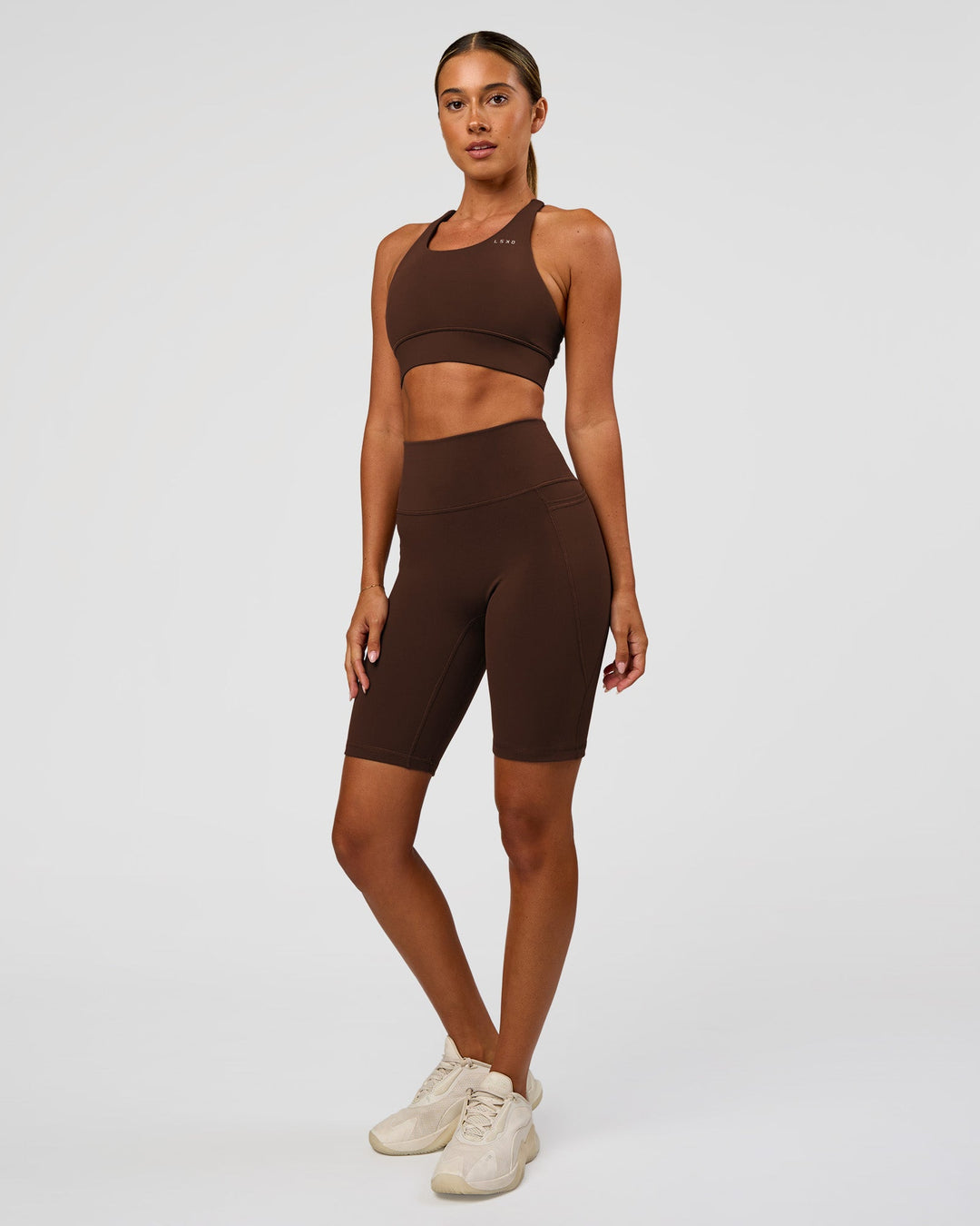 Woman wearing Accelerate Sports Bra - Hot Chocolate | Model:Charli | Size:XS - view 5