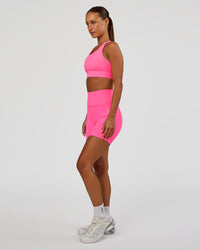Woman wearing Accelerate Sports Bra - Sugar Plum | Model:Brylee | Size:XS | Thumbnail Index: 4