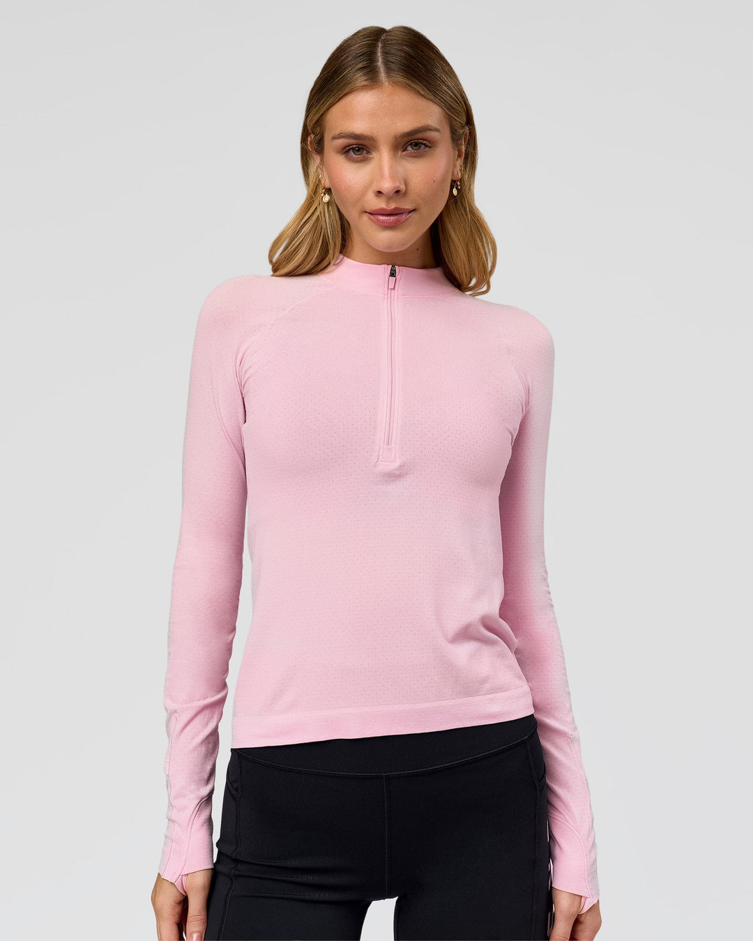Woman wearing AeroFLX+ Long Sleeve Half Zip - Marshmallow/Marshmallow | Model:Leilani | Size:XS