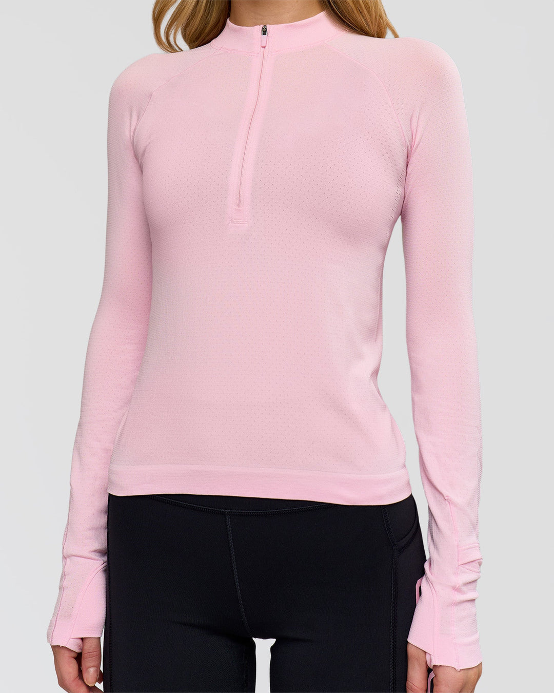 Woman wearing AeroFLX+ Long Sleeve Half Zip - Marshmallow/Marshmallow | Model:Leilani | Size:XS