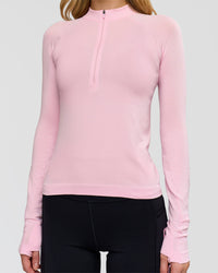 Woman wearing AeroFLX+ Long Sleeve Half Zip - Marshmallow/Marshmallow | Model:Leilani | Size:XS