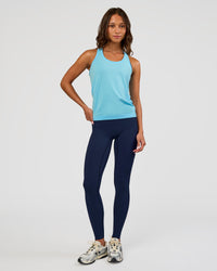 Woman wearing AeroFLX+ Seamless Tank - Baltic Sea/Baltic Sea | Model:Dakota | Size:XS