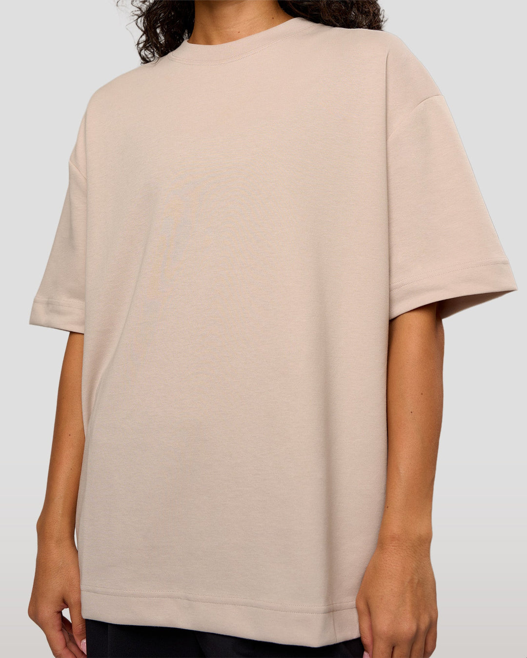 Woman wearing AfterDark ZeroCrease Oversized Tee - Shale Beige | Model:Jasmine | Size:XS - view 9