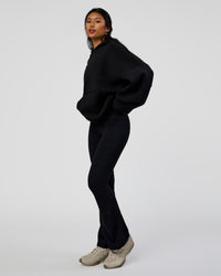 Woman wearing AfterDark ZeroCrease Oversized Hoodie - Black | Model:Loren | Size:XS