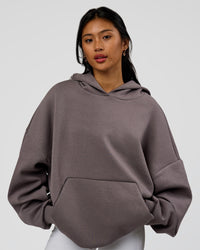 Woman wearing AfterDark ZeroCrease Oversized Hoodie - Duskstone | Model:Loren | Size:XS
