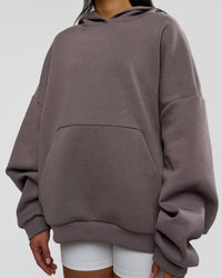 Woman wearing AfterDark ZeroCrease Oversized Hoodie - Duskstone | Model:Loren | Size:XS