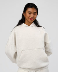 Woman wearing AfterDark ZeroCrease Oversized Hoodie - Silver Marl | Model:Loren |Size:XS