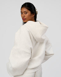 Woman wearing AfterDark ZeroCrease Oversized Hoodie - Silver Marl | Model:Loren |Size:XS