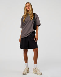 Woman wearing AfterDark ZeroCrease Oversized Tee - Duskstone | Model:Georgia | Size:XS