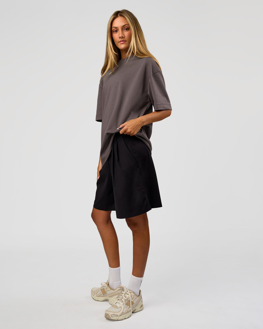 Woman wearing AfterDark ZeroCrease Oversized Tee - Duskstone | Model:Georgia | Size:XS