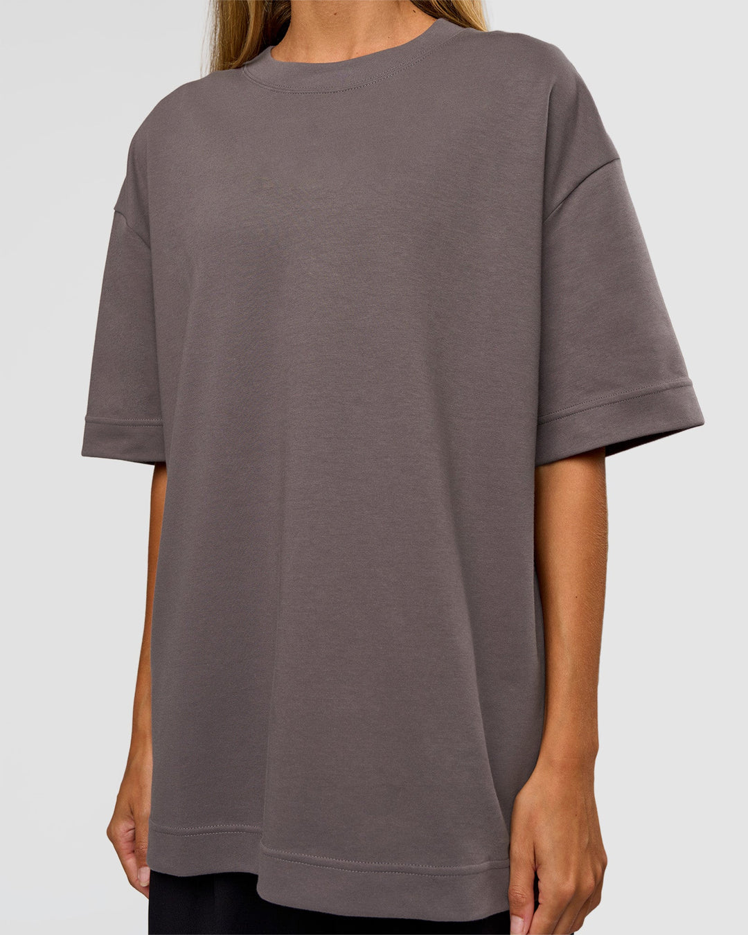 Woman wearing AfterDark ZeroCrease Oversized Tee - Duskstone | Model:Georgia | Size:XS